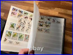 BIRDS ON STAMPS large stockbook 45 sides mint and used 2