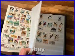 BIRDS ON STAMPS large stockbook 45 sides mint and used 2