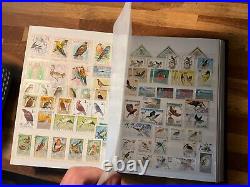 BIRDS ON STAMPS large stockbook 45 sides mint and used 2