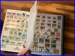 BIRDS ON STAMPS large stockbook 45 sides mint and used 2