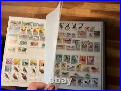 BIRDS ON STAMPS large stockbook 45 sides mint and used 2