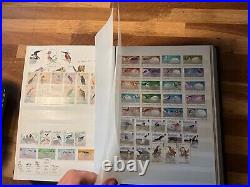 BIRDS ON STAMPS large stockbook 45 sides mint and used 2