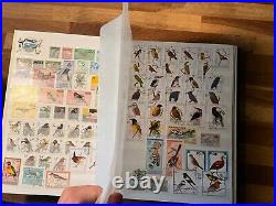 BIRDS ON STAMPS large stockbook 45 sides mint and used 2