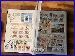 BIRDS ON STAMPS large stockbook 45 sides mint and used 2