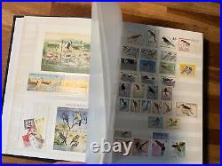 BIRDS ON STAMPS large stockbook 45 sides mint and used 2