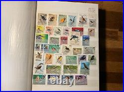 BIRDS ON STAMPS large stockbook 45 sides mint and used 2