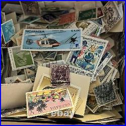 BOX LOT WW STAMP LOT. 1,000's OFF PAPER STAMPS FROM 100+ COUNTRIES, MINIMAL US