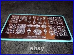 Maniology lot of 16 both newer and retired plates Stamping plates. (Read)