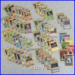 Near complete lot of 63 x Base Set 1st Edition Grey Stamp Error Non holos LP-NM