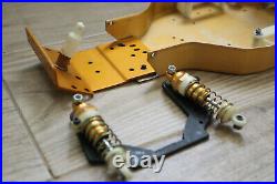 Vintage RC10 Parts Lot with A&L Rear Susp. Light Gold A Stamp Chassis, Shocks